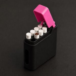 May include: A black rectangular case with a hinged bright pink lid, containing seven white cylindrical inserts. One insert is open at the top, revealing a brown granular substance inside, while the others are capped with flat white circular tops.