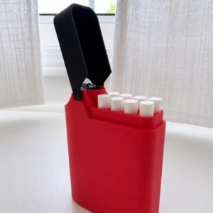 May include: A bright red rectangular case with a hinged black lid, containing eight white cylindrical sticks arranged in two rows. The case features a stepped top design where the lid is attached to the taller side, exposing the white contents.