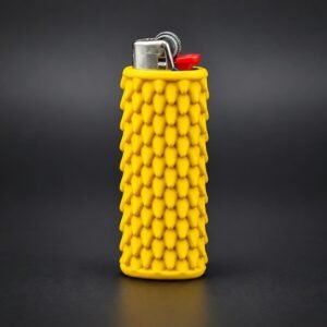 May include: A yellow lighter encased in a textured silicone sleeve featuring a repeating pattern of small, pointed, cone-shaped spikes. The top of the lighter displays a metallic ignition mechanism with a small red plastic lever for operation.